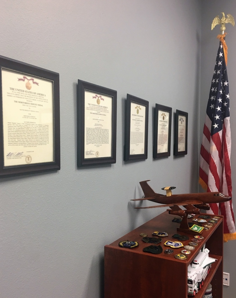 A wall of achievements in Scott's office