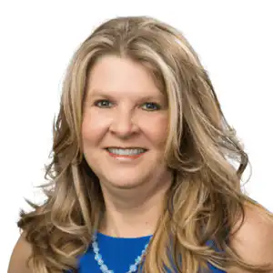 Professional headshot of Emily Detwiler, Senior Underwriter at Morgan Financial, smiling in a royal blue top.
