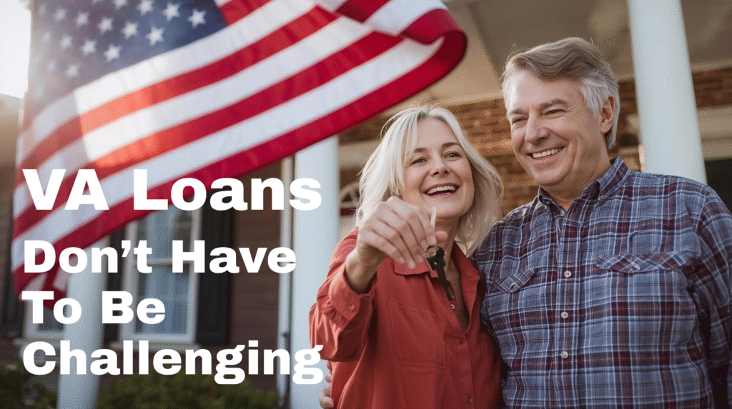 A smiling couple stands in front of their new home holding keys, with a large American flag waving above them. White bold text reads, “VA Loans Don’t Have To Be Challenging.”