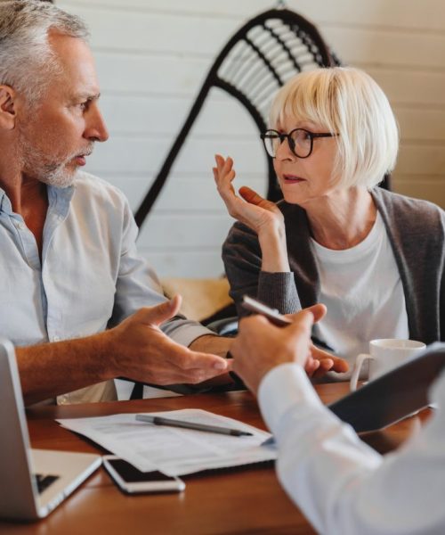 financial-advisor-giving-retirement-advice-to-old-couple-while-they-arguing-at-home-interior.jpg financial-advisor-giving-retirement-advice-to-old-couple-while-they-arguing-at-home-interior.jpg