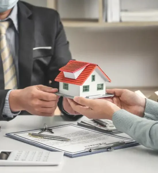real-estate-brokers-offer-home-designs-for-clients-to-trade-with-a-mortgage-loan-contract.jpg